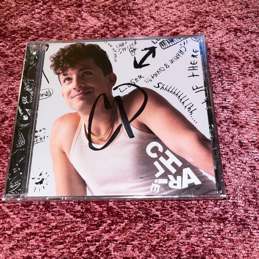 Charlie Puth signed cd